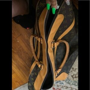 - Louis Vuitton Vintage overnight bag